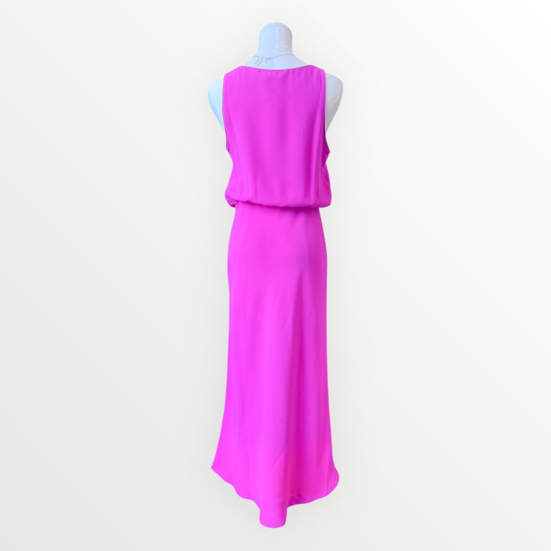 Pink dress on a mannequin against a white background