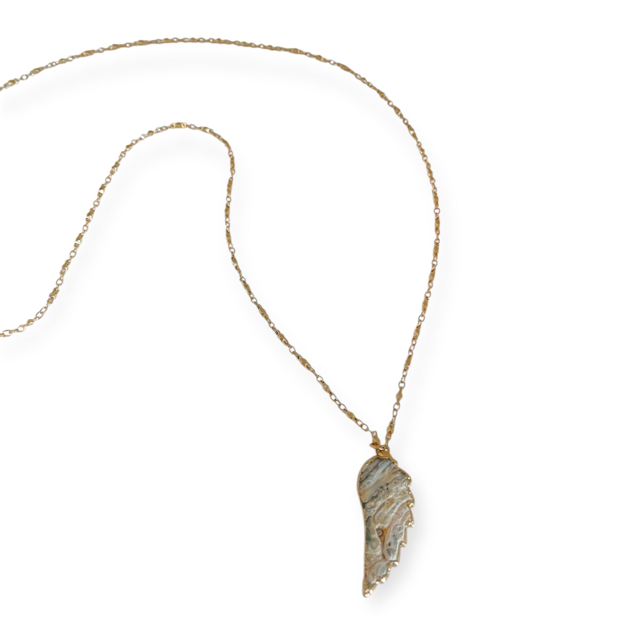 Necklace with a leaf-shaped pendant on a white background