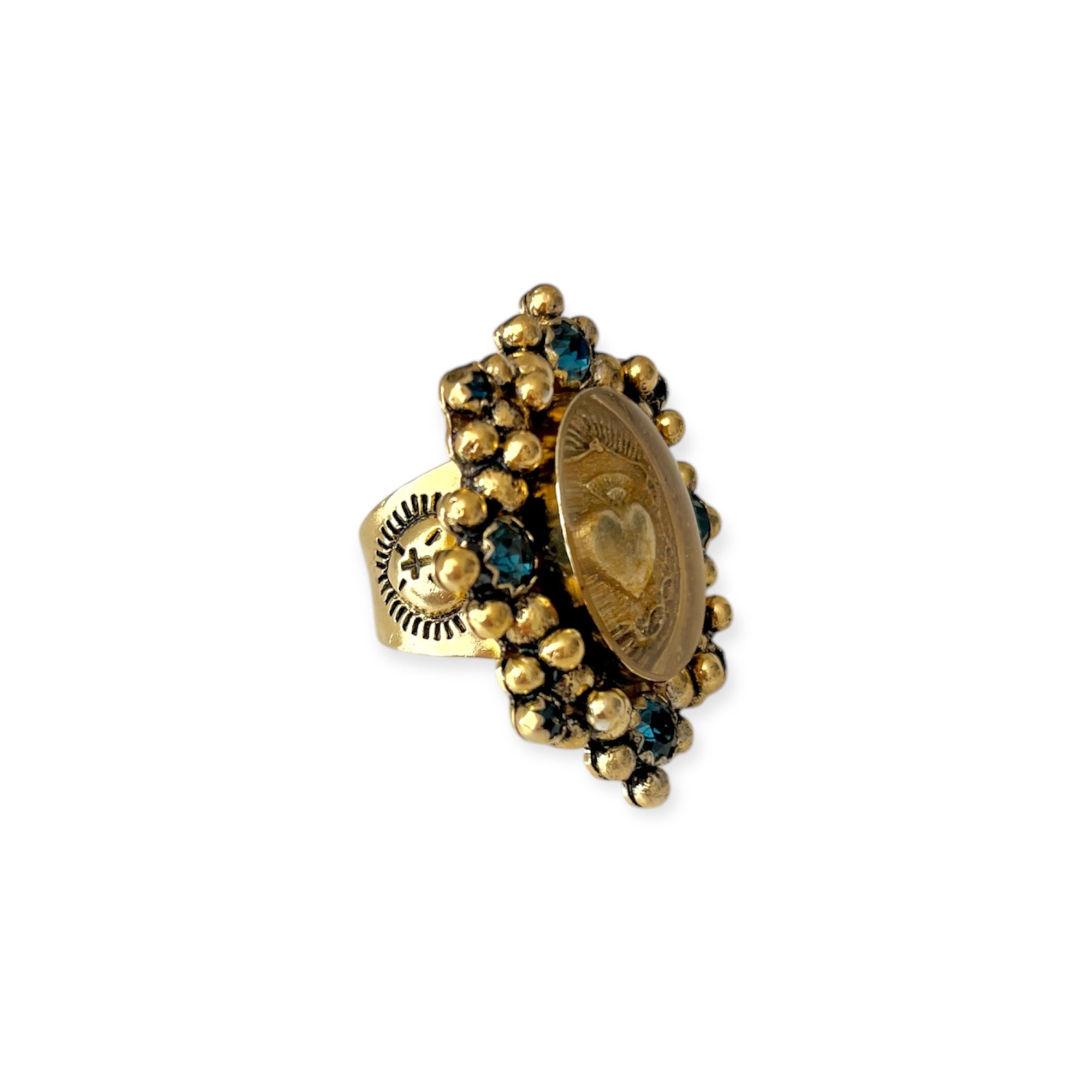 Oval Cloister Sacred Heart Ring in Bright Gold Montana