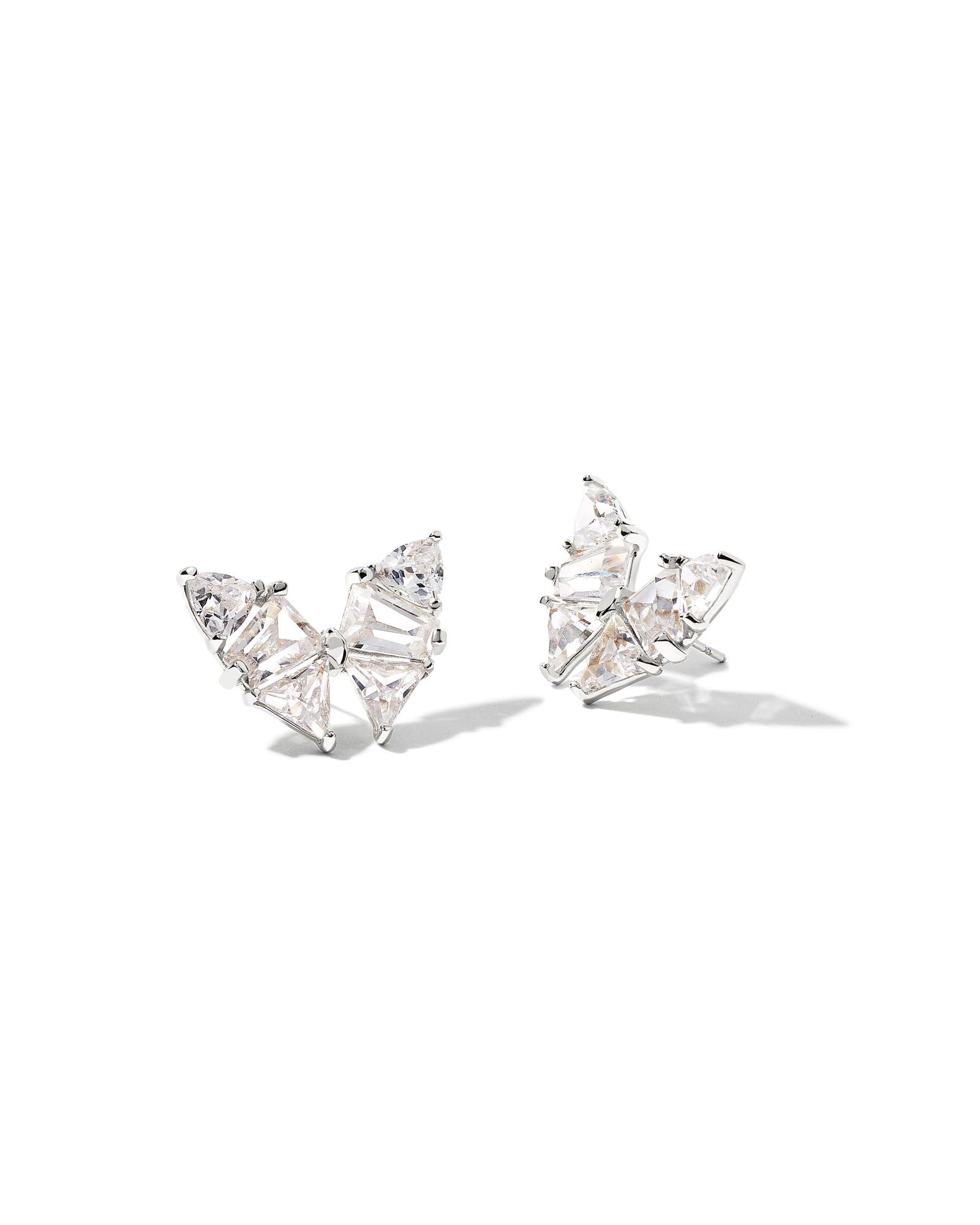 Pair of diamond earrings on a white background