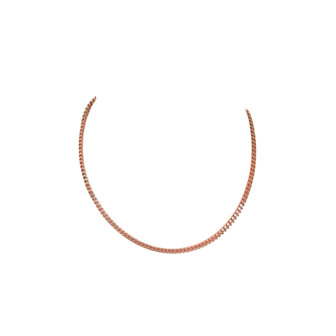 Rose gold chain necklace on a mannequin bust against a white background