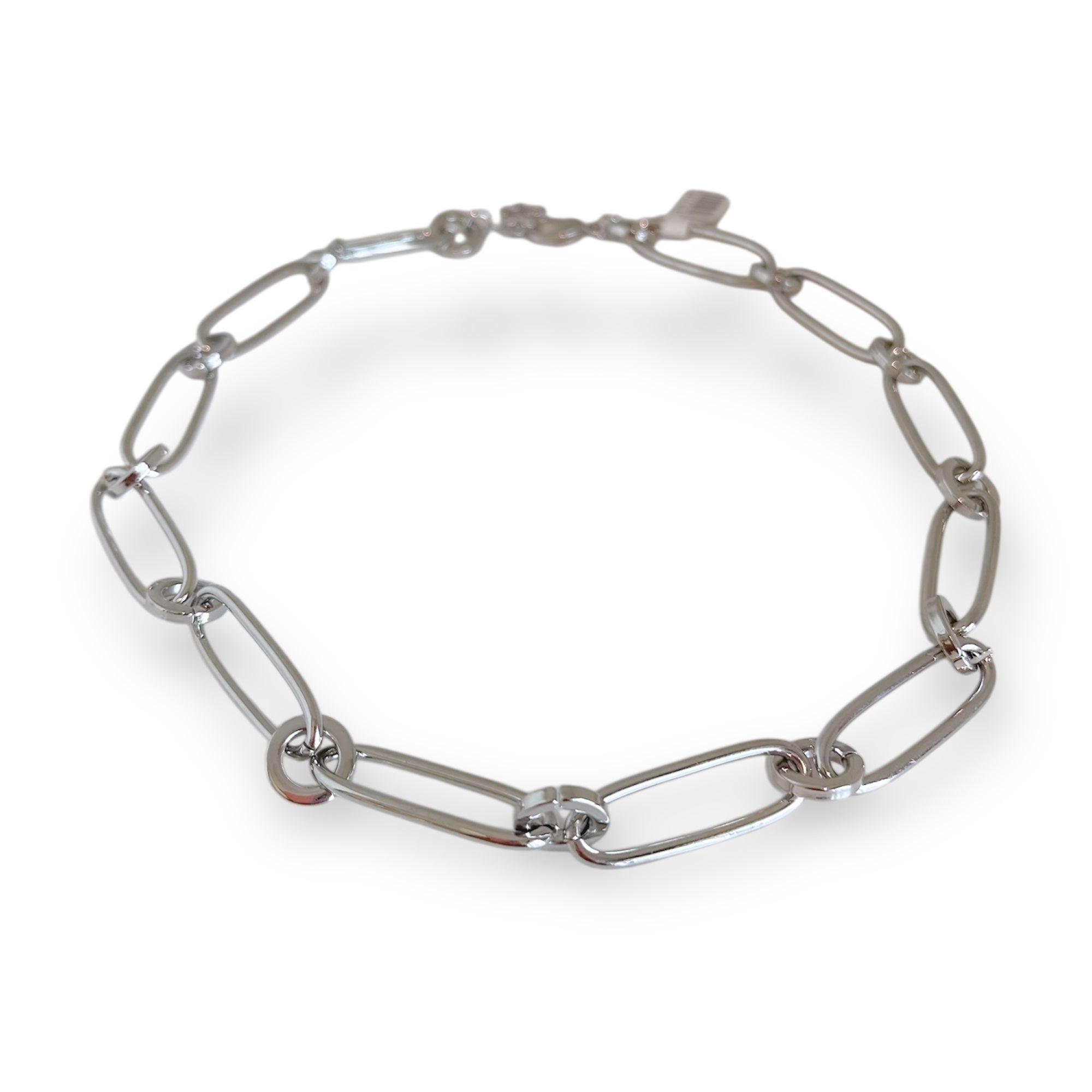 Silver chain necklace on a white background