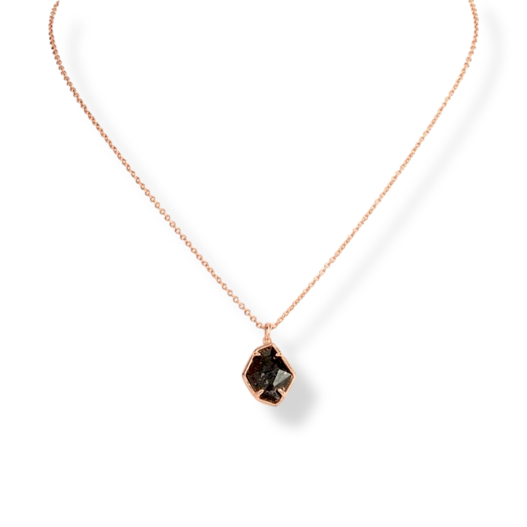 Necklace with a black gemstone pendant on a white background