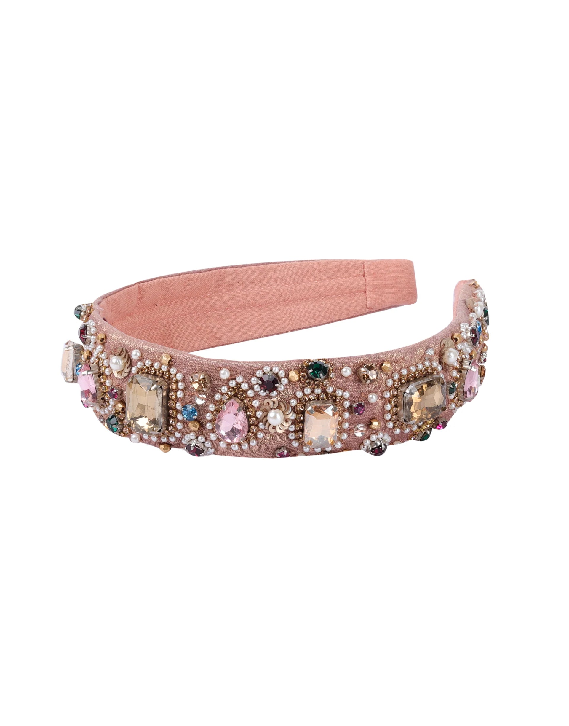 Pink headband with decorative gems on a white background