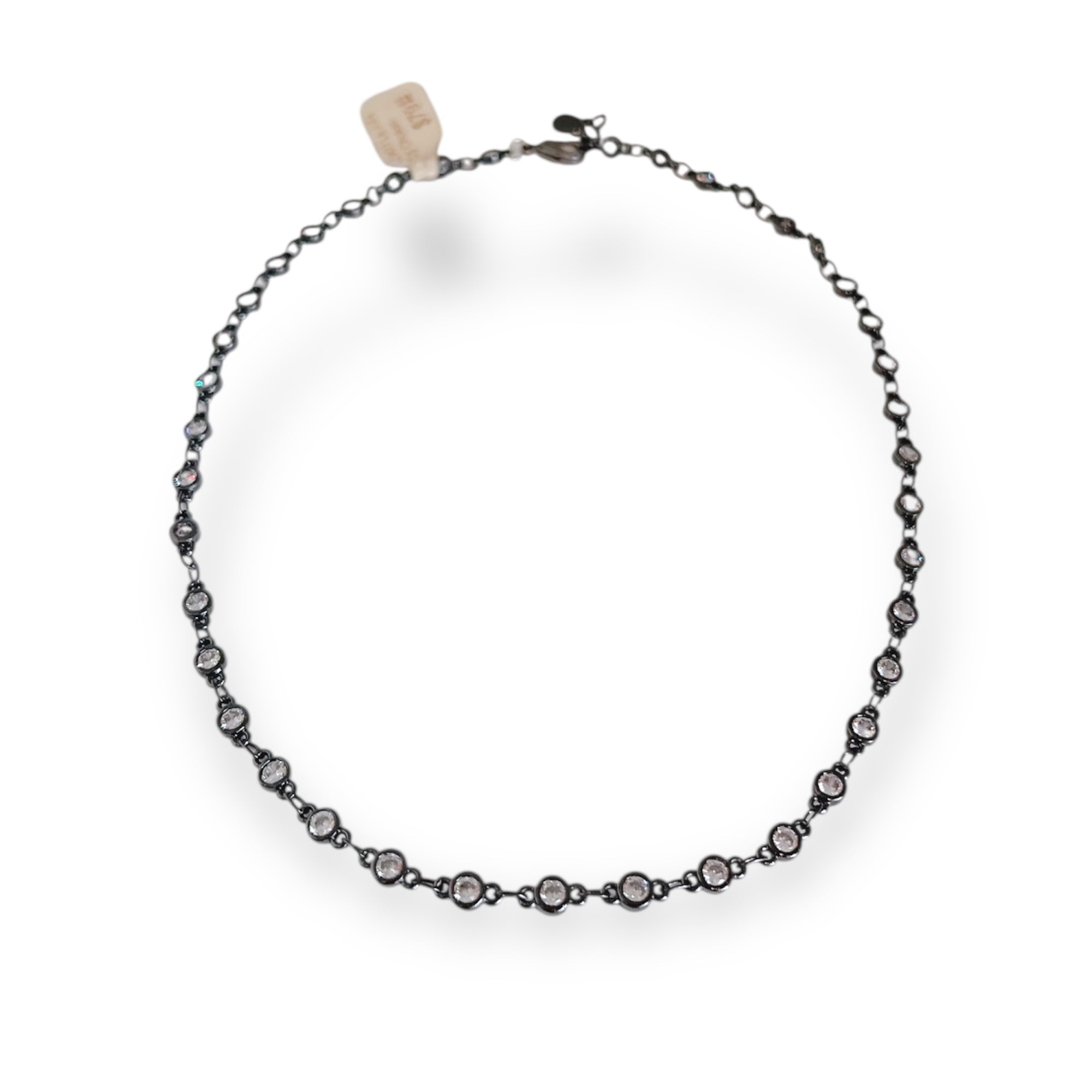 Necklace with small round crystal on a white background
