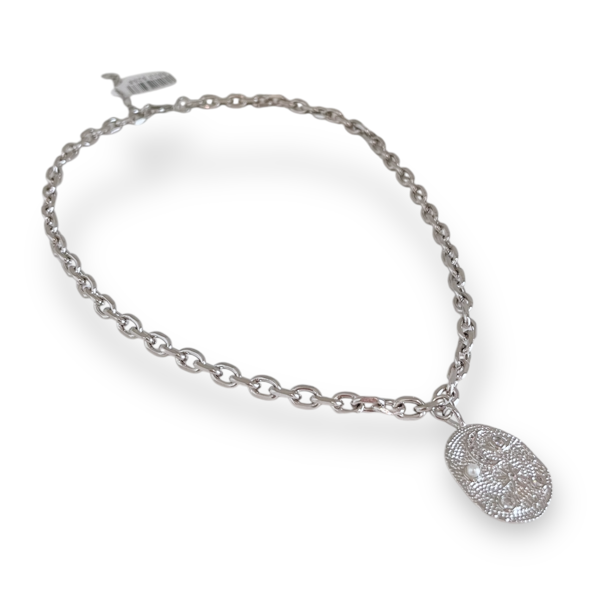 Silver bracelet with a decorative clasp on a white background