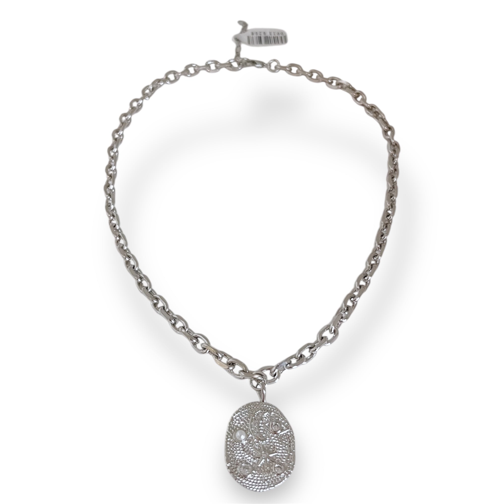 Silver chain necklace with a detailed pendant on a white background