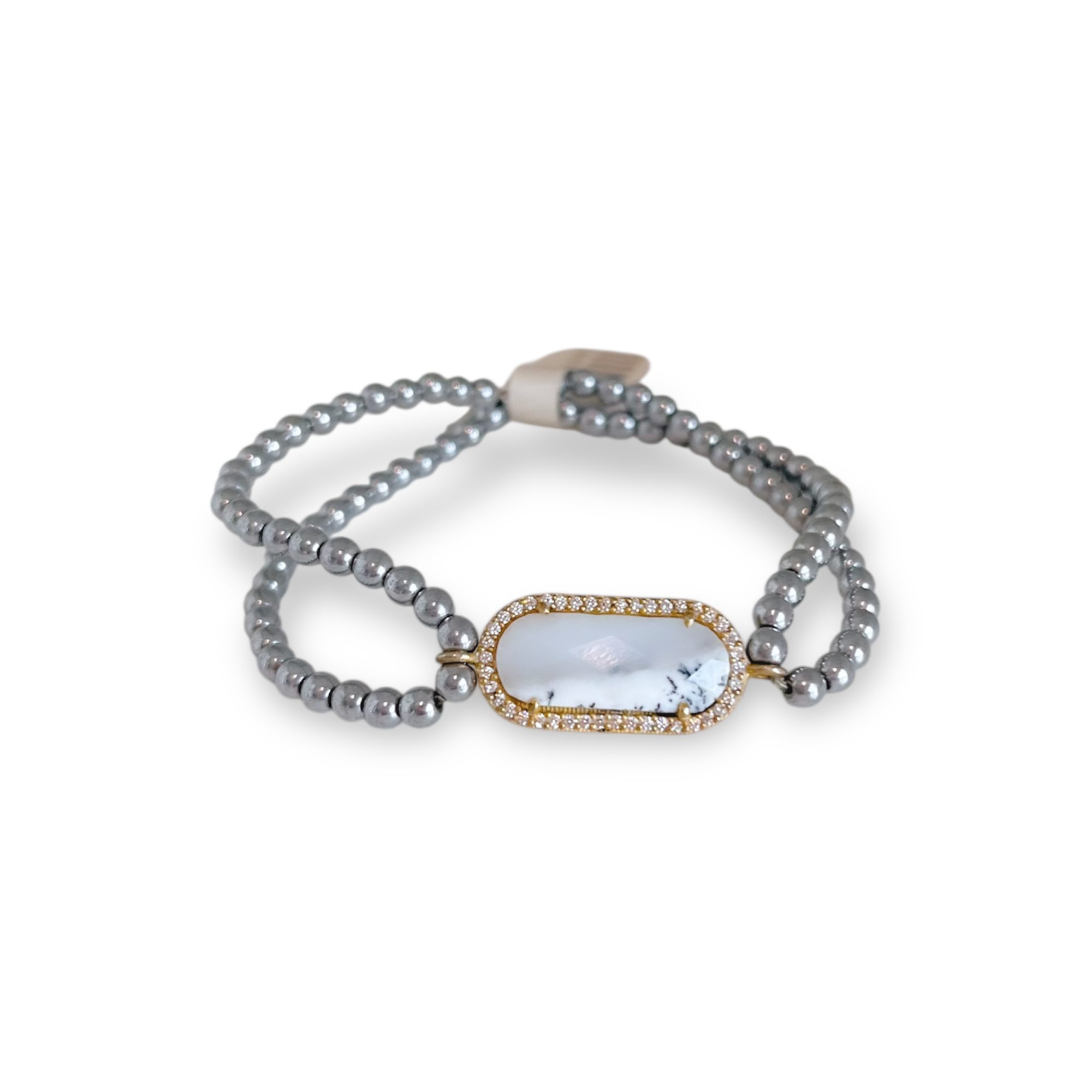 Gray beaded bracelet with a decorative clasp on a white background