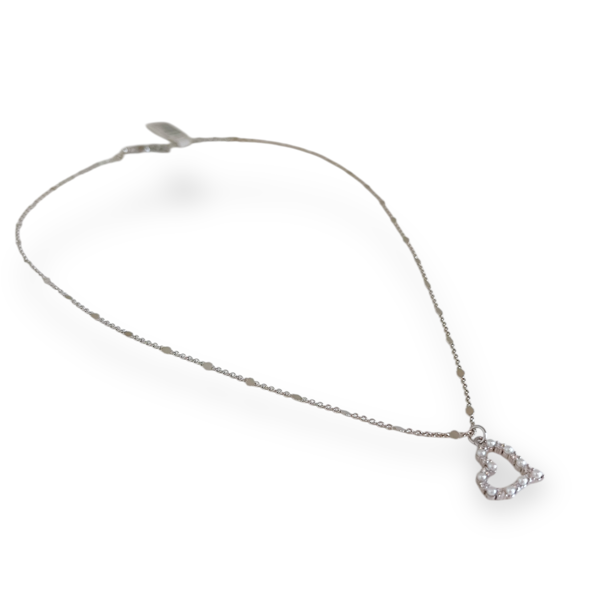 Silver necklace with a heart-shaped pendant on a white background