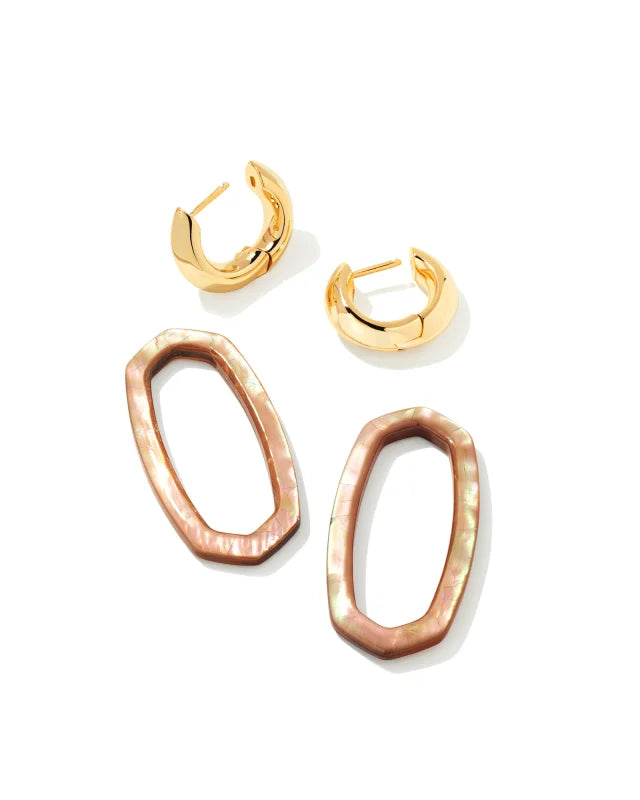 Gold and rose gold hoop earrings on a white background